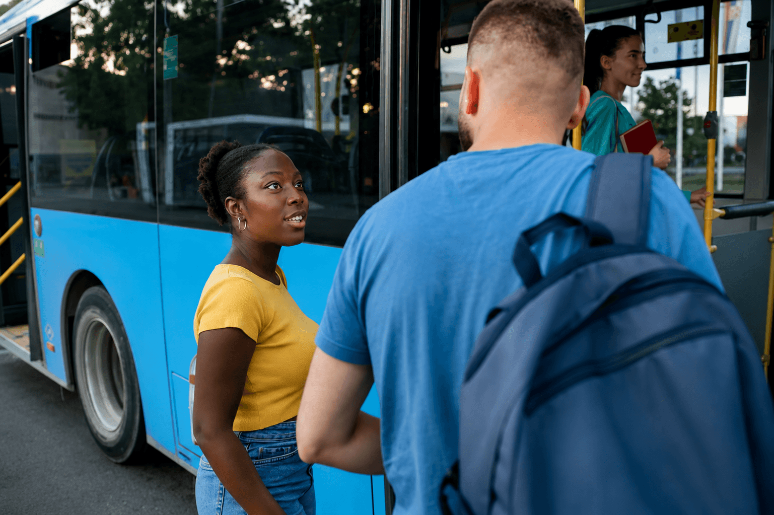 Employee transportation service with passengers boarding a comfortable city bus for daily workplace travel.